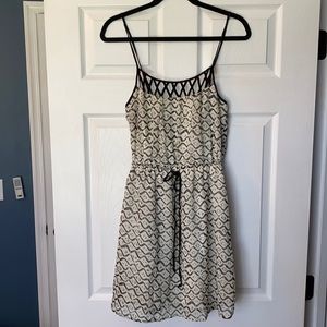 Beautiful criss cross neck black and cream dress